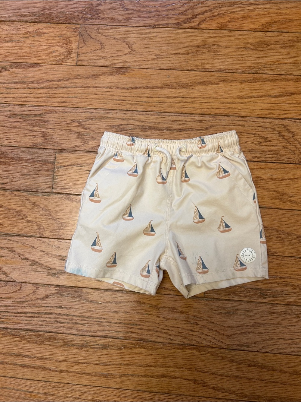 Rylee + Cru Kids Sailboat Swim Shorts in Beige
